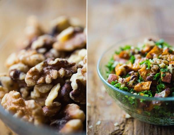 This Roasted Sweet Potato Salad has a handful of shredded kale, candied walnuts, and the best creamy almond dressing. Yum! | pinchofyum.com